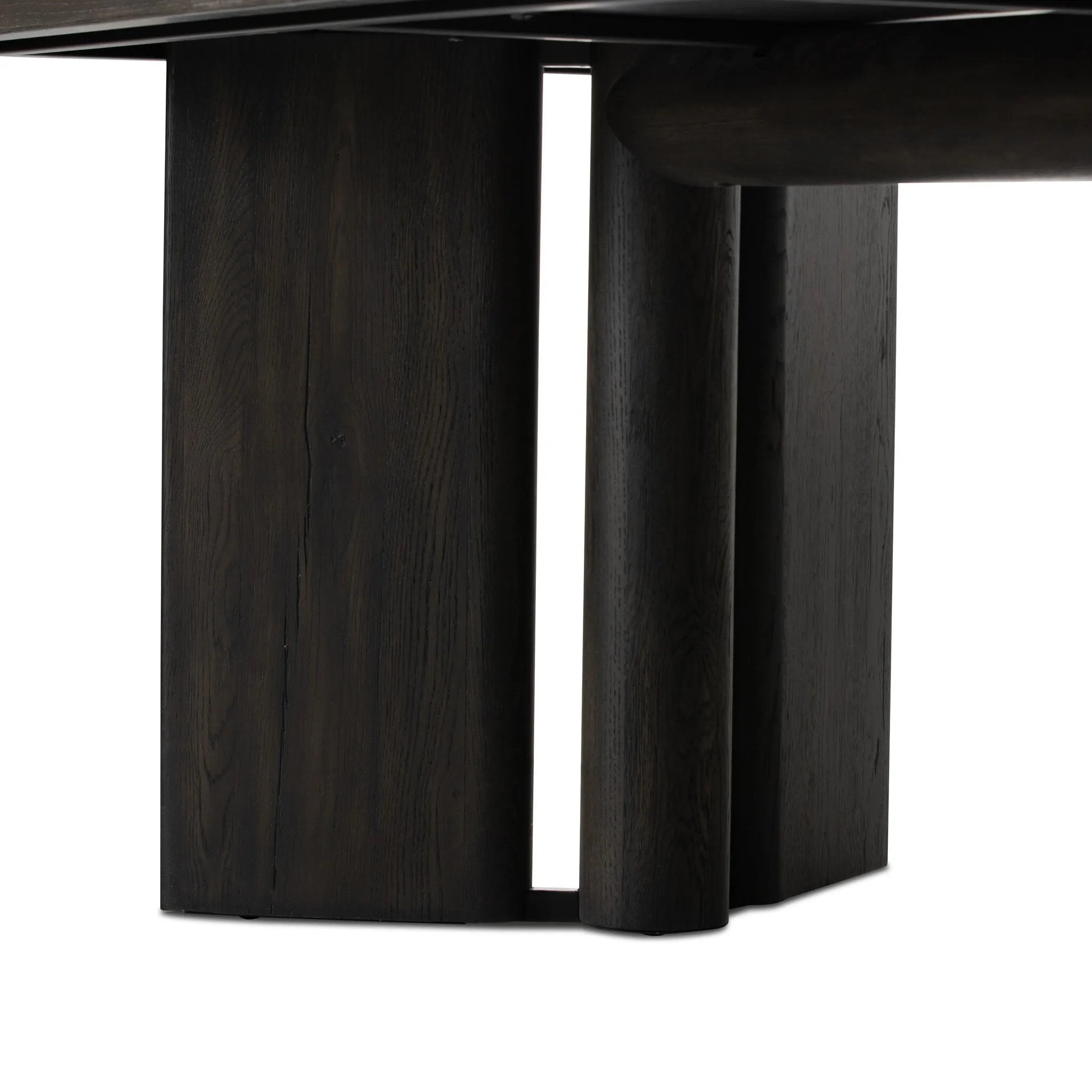 A smoked black finish brings character to this substantially sized dining table. Angled panel legs separated by a round cylinder craft a geometric look.Collection: Haide Amethyst Home provides interior design, new home construction design consulting, vintage area rugs, and lighting in the Nashville metro area.