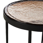 Smoky brown glass-topped table with slim, tapered matte black metal frames for a sleek, modern look. Part of a nesting set, can be used alone or paired with its larger counterpart.Collection: Marlo Amethyst Home provides interior design, new home construction design consulting, vintage area rugs, and lighting in the Calabasas metro area.