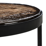 Smoky brown glass-topped table with slim, tapered matte black metal frames for a sleek, modern look. Part of a nesting set, can be used alone or paired with its larger counterpart.Collection: Marlo Amethyst Home provides interior design, new home construction design consulting, vintage area rugs, and lighting in the Miami metro area.