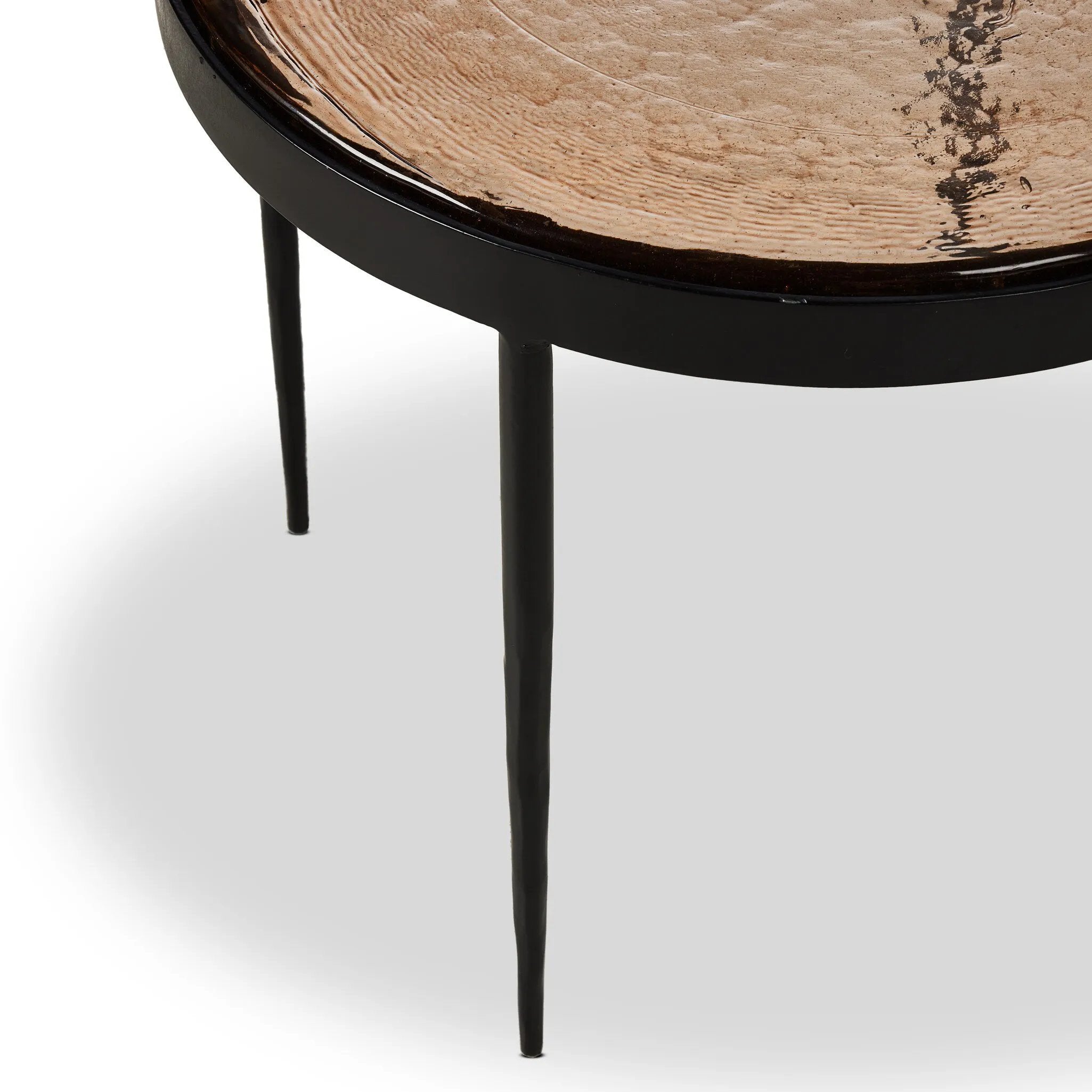 Smoky brown glass-topped table with slim, tapered matte black metal frames for a sleek, modern look. Part of a nesting set, can be used alone or paired with its larger counterpart.Collection: Marlo Amethyst Home provides interior design, new home construction design consulting, vintage area rugs, and lighting in the Tampa metro area.