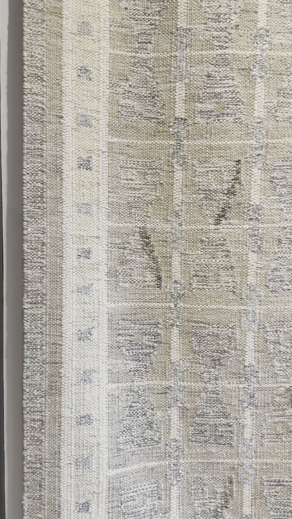 The Lucie Kilim rug features gorgeous muted hues of taupe, ivory and grey. The flatware handwoven technique and allows for a livable, durable, anchor to any space.