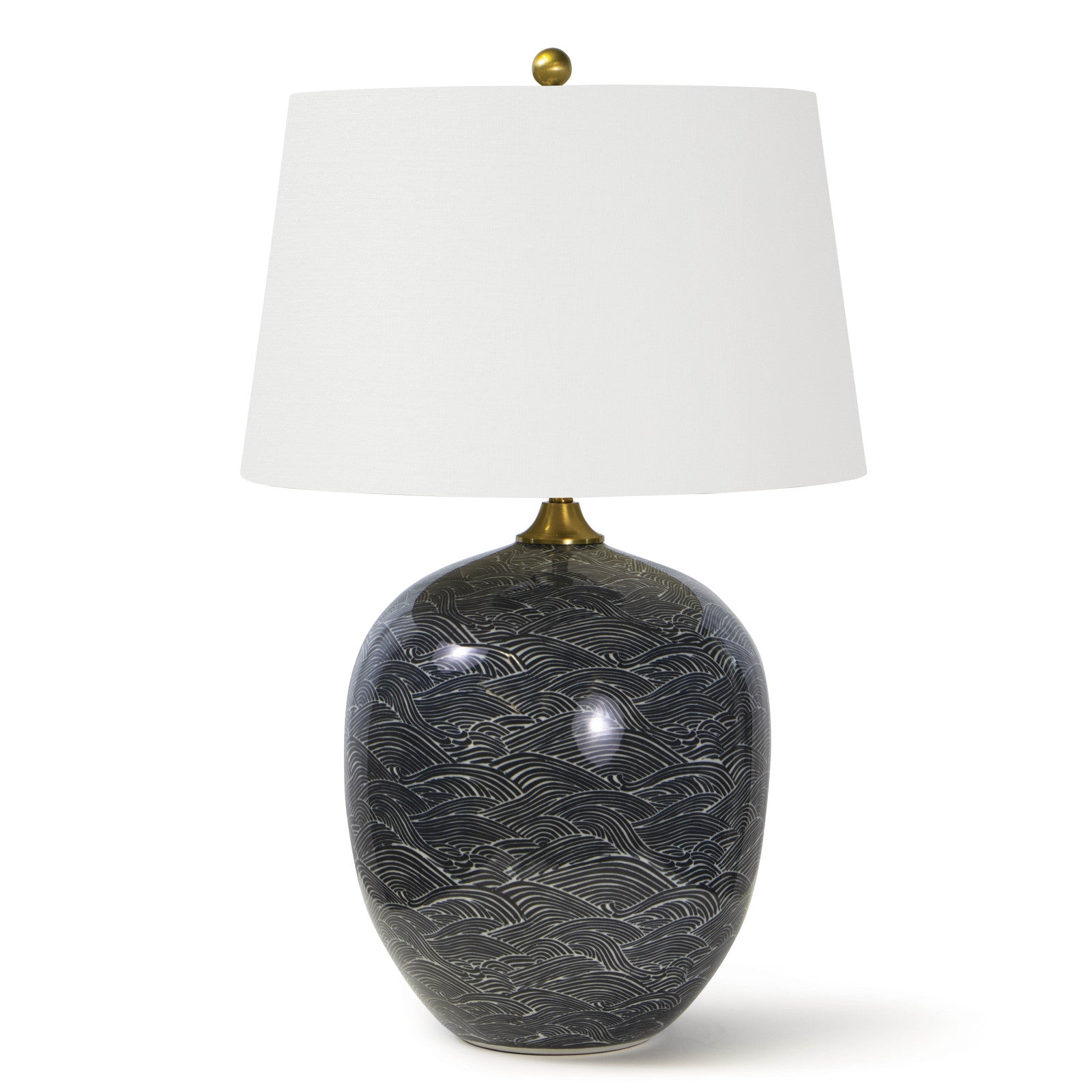 This Harbor Ceramic Table Lamp by Regina Andrew features a specialized glazing technique that highlights the gorgeous pattern in shades of black or blue. The natural linen shade brings a warm, sophisticated look to any living room, bedroom, or other area needing.  Overall Dimension: 18