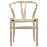 A trendy take on a classic mid-century modern wishbone chair. This dining chair stands out with its curved, oak wood frame and craft paper woven seating. The woven seat adds an organic feel to the sculptural form and cutout back design, while the light finish completes the fresh and airy look. Certainly, a statement piece.Arm_height : 26 in Amethyst Home provides interior design, new home construction design consulting, vintage area rugs, and lighting in the Seattle metro area.