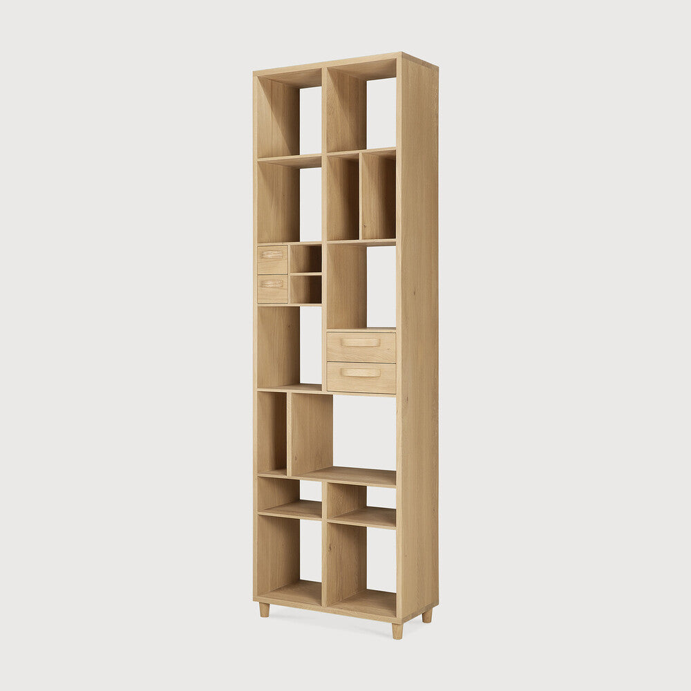Playful yet somber, the 60s-inspired Pirouette bookrack is a functional storage space that doubles as a statement piece. Amethyst Home provides interior design, new home construction design consulting, vintage area rugs, and lighting in the Dallas metro area.