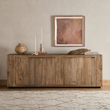 Made from thick-cut oak veneer with a faux rustic finish made to emulate wormwood, this low, large-scale sideboard features chunky squared legs and dovetail joinery detailing. Amethyst Home provides interior design, new home construction design consulting, vintage area rugs, and lighting in the Calabasas metro area.
