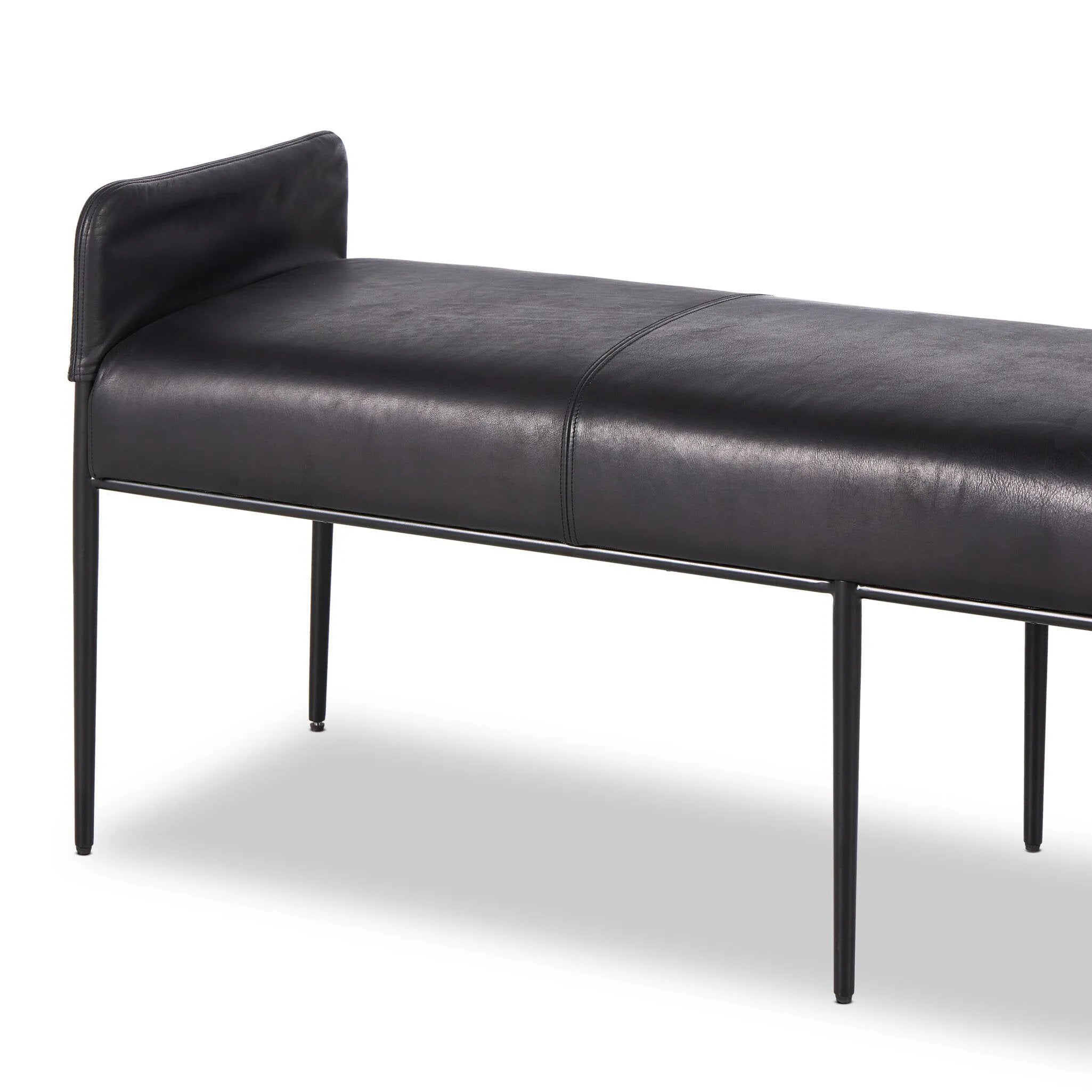 Black top-grain leather steals the show in this sleek, simple bench. Sourced from one of the oldest family-owned tanneries in Italy's Bassano del Grappa, heirloom leather is salvaged and processed from upcycled hides featuring an abundance of natural markings, scars and color variations. Amethyst Home provides interior design, new home construction design consulting, vintage area rugs, and lighting in the Salt Lake City metro area.