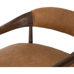 Safari styling is brought to modern speed on this vintage-inspired chair. Its solid wood frame features a webbed seating structure that brings a sink-in feel to the entire piece. The upholstered back, strap details and loose cushion are finished in carbon neutral, vegetable-tanned leather processed using naturally fallen eucalyptus leaves in Uruguay. Amethyst Home provides interior design, new construction, custom furniture, and area rugs in the Winter Garden metro area.