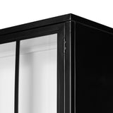 Finished in a classic black, large-scaled iron cabinetry takes on tempered glass door fronts with traditional window-style paneling, for an open look with great contrast. Amethyst Home provides interior design, new construction, custom furniture, and area rugs in the Des Moines metro area.