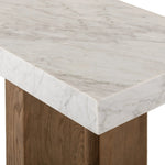 Structured and geometric, an open-style console table pairs smoked oak veneer with white marble, for a sophisticated material mix.Collection: Hughe Amethyst Home provides interior design, new home construction design consulting, vintage area rugs, and lighting in the Los Angeles metro area.