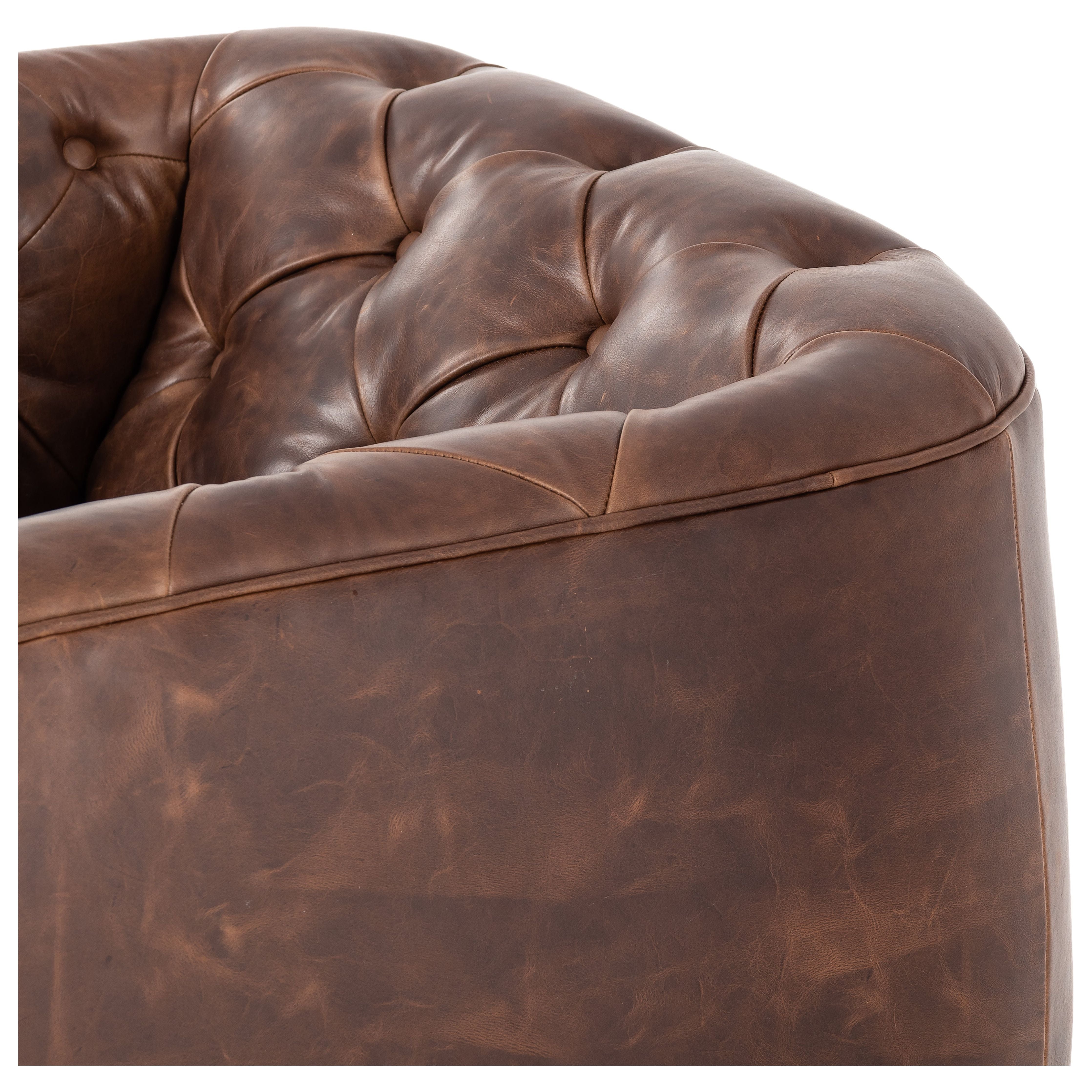 Old English-inspired top-grain leather is finished with a soft hand for a vintage, lived-in look on this traditionally inspired chair. Handcrafted in Italy, the richness of this distinctive, full-bodied leather develops an even-richer patina over time. Button tufting texturizes a comfortably curved back and sides, while a 360-degree swivel modernizes the whole look. Amethyst Home provides interior design, new construction, custom furniture, and area rugs in the Dallas metro area.