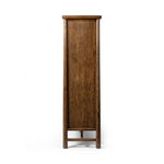 A beautifully simple statement piece. This three-door cabinet is crafted from a mix of solid oak and veneer in a dark toasted finish. Details include subtle, tapered corner posts and minimal rounded door knobs.Collection: Well Amethyst Home provides interior design, new home construction design consulting, vintage area rugs, and lighting in the Dallas metro area.
