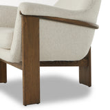 Comfort and style meet on this vintage-inspired accent chair. A curvy silhouette, classic rolled arms and loose seat cushion are paired with an exposed wood frame for a fresh new take. Upholstered in a texture-forward boucle performance fabric. Amethyst Home provides interior design, new home construction design consulting, vintage area rugs, and lighting in the Monterey metro area.
