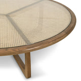 Materials mingle in this rounded coffee table of warm solid oak, natural cane and tempered glass. A Y-shaped base reflects midcentury inspiration.Collection: Irondal Amethyst Home provides interior design, new home construction design consulting, vintage area rugs, and lighting in the Tampa metro area.