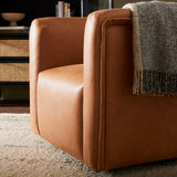 Inspired by 70s vintage seating and plush duvet toppers, a structured, supportive seat is covered in a Four Hands-exclusive top-grain leather in a rich cognac tone. A 360-degree swivel modernizes this vintage-leaning look. Amethyst Home provides interior design, new construction, custom furniture, and area rugs in the San Diego metro area.