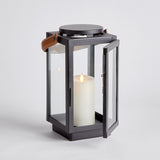 Featuring a real leather handle with tailored stitching, this well-scaled lantern is a mix of traditional and modern aesthetics. A beautiful accent for entryway, living room or study. Amethyst Home provides interior design, new construction, custom furniture, and area rugs in the Washington metro area.