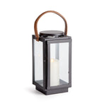 Featuring a real leather handle with tailored stitching, this well-scaled lantern is a mix of traditional and modern aesthetics. A beautiful accent for entryway, living room or study. Amethyst Home provides interior design, new construction, custom furniture, and area rugs in the Winter Garden metro area.