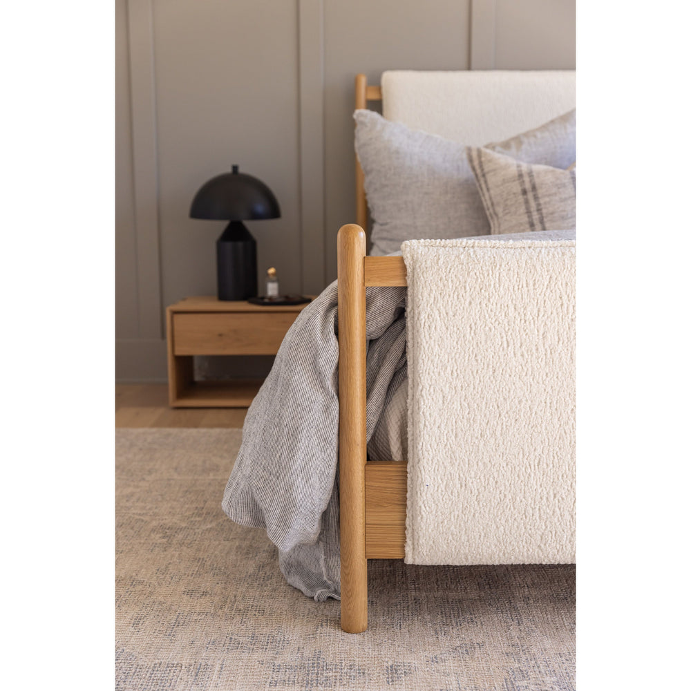 Featuring Bowen Bed by Four Hands at Amethyst Home. Bring a cozy hygge vibe to the bedroom with this textured Bowen Bed. Framed by light-finished solid oak, a sling-style bed features faux shearling head and foot boards -- sure to elevate any bedroom. 
Queen Overall Dimensions: 64.25"W x 87.25"L x 48"HKing Overall Dimensions: 80.25"W x 88.50"L x 48"H
Colors: Sh. Amethyst Home provides interior design, new home construction design consulting, vintage area rugs, and lighting in the Miami metro area.