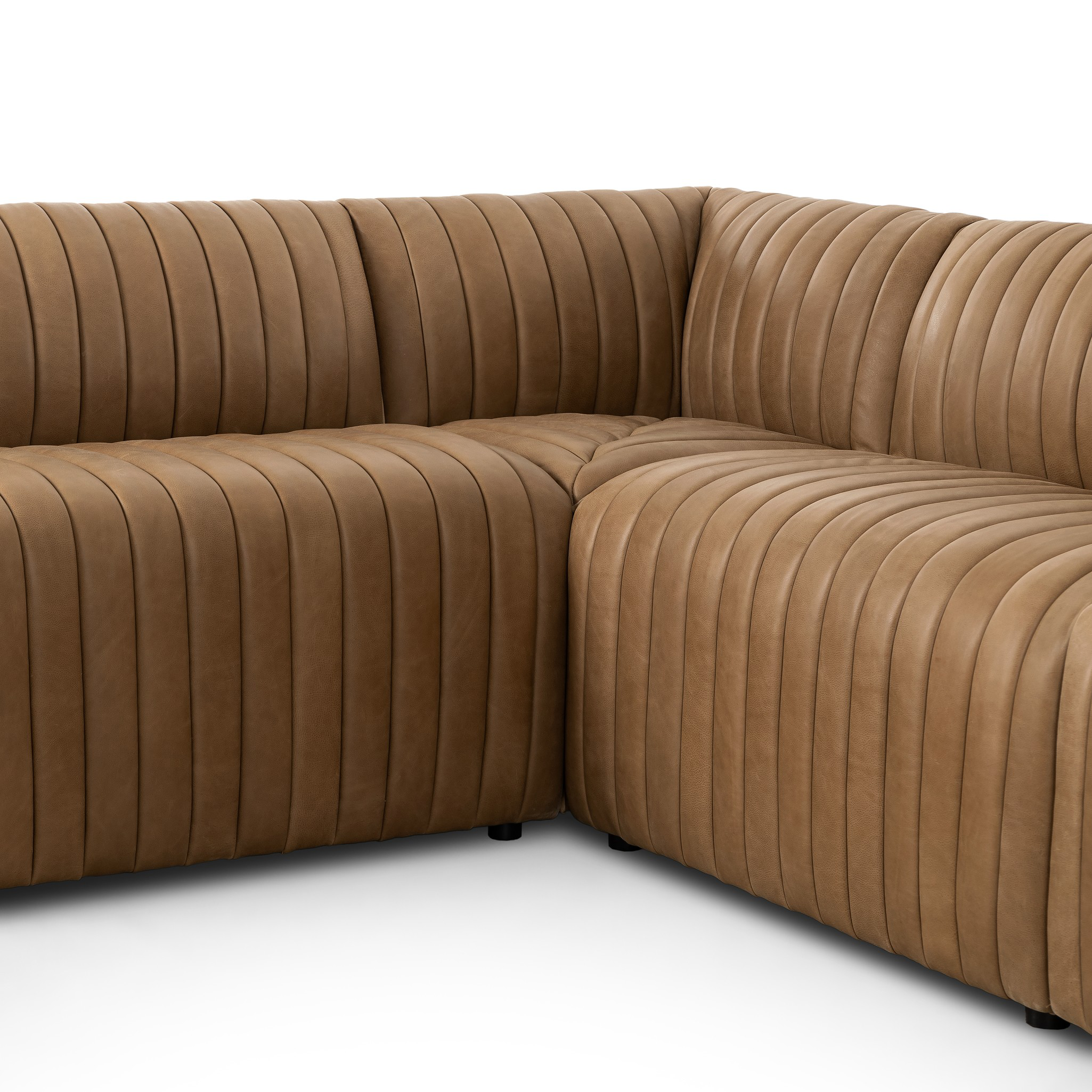 Featuring Augustine Palermo Drift Dining Banquette L Shape 91.5" by Four Hands at Amethyst Home. The beauty of this modular piece is that the vertical channeling makes for a cohesive feel despite being modular.  Welcome to your new favorite nook for morning coffee. An L-shaped dining banquette is upholstered in tan top-grain leather with a beautifully pronounce. Amethyst Home provides interior design, new home construction design consulting, vintage area rugs, and lighting in the Tampa metro area.