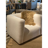 The Clemence Swivel Club Chair showcases a sleek, minimalist design with clean, low-profile lines, enhanced by a plush tight seat for ultimate comfort. Amethyst Home provides interior design, new home construction design consulting, vintage area rugs, and lighting in the Omaha metro area.