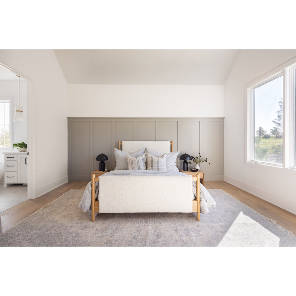 Featuring Bowen Bed by Four Hands at Amethyst Home. Bring a cozy hygge vibe to the bedroom with this textured Bowen Bed. Framed by light-finished solid oak, a sling-style bed features faux shearling head and foot boards -- sure to elevate any bedroom. 
Queen Overall Dimensions: 64.25"W x 87.25"L x 48"HKing Overall Dimensions: 80.25"W x 88.50"L x 48"H
Colors: Sh. Amethyst Home provides interior design, new home construction design consulting, vintage area rugs, and lighting in the Omaha metro area.