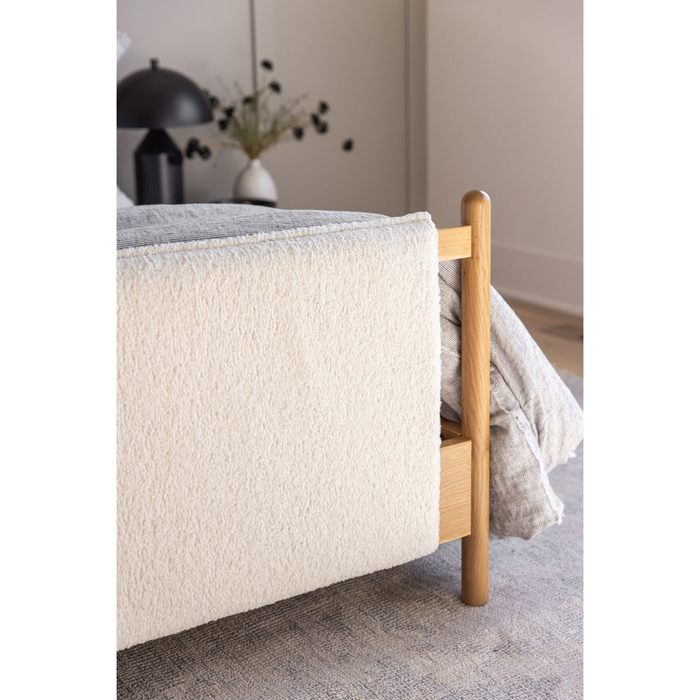 Featuring Bowen Bed by Four Hands at Amethyst Home. Bring a cozy hygge vibe to the bedroom with this textured Bowen Bed. Framed by light-finished solid oak, a sling-style bed features faux shearling head and foot boards -- sure to elevate any bedroom. 
Queen Overall Dimensions: 64.25"W x 87.25"L x 48"HKing Overall Dimensions: 80.25"W x 88.50"L x 48"H
C. Amethyst Home provides interior design, new home construction design consulting, vintage area rugs, and lighting in the Salt Lake City metro area.