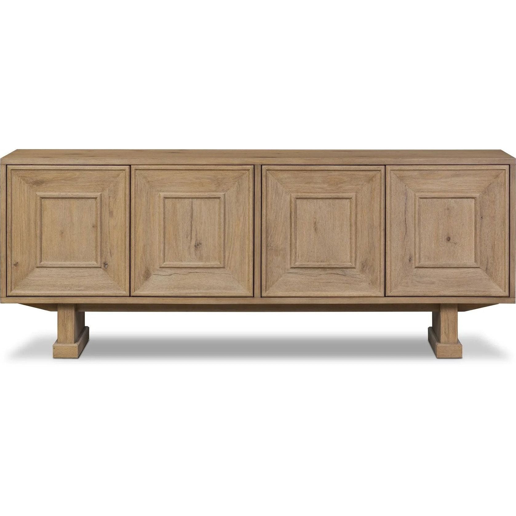 Store favorite dinnerware, table linens and more in this modernized Deco sideboard, with inverted chamfered framing and molding around the doors. Made from solid oak with a light, drifted finish and ski-style legs that elevate the whole piece Amethyst Home provides interior design, new home construction design consulting, vintage area rugs, and lighting in the Austin metro area.