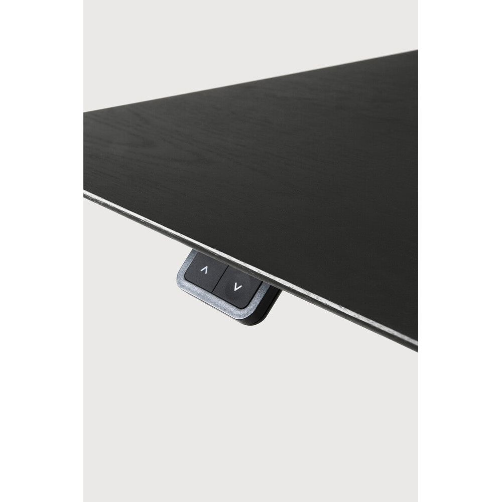 Featuring Bok Black Us Oak Black Adjustable Desk by Ethnicraft at Amethyst Home. The Bok adjustable desk was designed with the importance of health and good posture in mind. The motorised system in its legs allows the tabletop to be elevated to the height of your liking. That way, you can easily switch between sitting and standing throughout the workday. Choose between white or black. Amethyst Home provides interior design, new construction, custom furniture, and area rugs in the Austin metro area