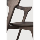 Over the years, the Bok dining chair has become one of our most recognisable designs. Designer Alain van Havre combines sculptural elegance and contemporary crafting into a graceful and airy form.

Seating height: 46cm - 18".
Made from brown tainted oak with a varnish finish. Amethyst Home provides interior design, new construction, custom furniture, and area rugs in the Portland metro area