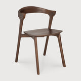 Featuring Bok No Upholstery Varnished Teak Brown Dining Chair by Ethnicraft at Amethyst Home. Reminiscent of a goat's curved horns, the Bok collection combines sculptural elegance and contemporary crafting into a graceful and airy form. Over the years, the Bok dining chair has become one of Ethnicraft's most recognisable designs.Weight : 33 lb Dimensions: 24.5 in W x 23 in L x 35 . Amethyst Home provides interior design, new construction, custom furniture, and area rugs in the Charlotte metro area