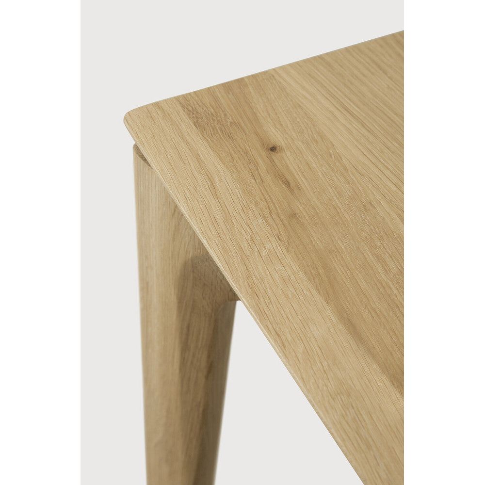 Featuring Bok Oak Rectangular Extendable Dining Table by Ethnicraft at Amethyst Home. Reminiscent of a goat's curved horns, the Bok collection combines sculptural elegance and contemporary crafting into a graceful and airy form. The signature Bok table made extendable to bring even more people together. Its airy shape yet rock-solid construction makes this solid oak extendable dining. Amethyst Home provides interior design, new construction, custom furniture, and area rugs in the Boston metro area