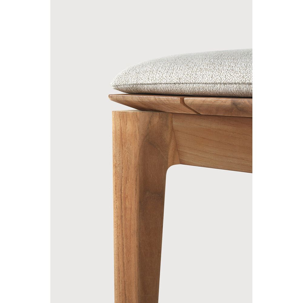 Featuring Bok Off White Teak Outdoor Bench by Ethnicraft at Amethyst Home. Reminiscent of a goat's curved horns, the Bok collection combines sculptural elegance and contemporary crafting into a graceful and airy form. Taking the quality design of the Bok collection outdoors, the Bok outdoor bench pairs perfectly with the Bok dining table, but also as a standalone outdoor seating o. Amethyst Home provides interior design, new construction, custom furniture, and area rugs in the Nashville metro area