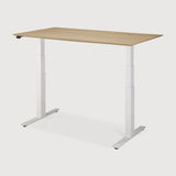 Featuring Bok White Us Oak Adjustable Desk by Ethnicraft at Amethyst Home. The Bok adjustable desk was designed with the importance of health and good posture in mind. The motorised system in its legs allows the tabletop to be elevated to the height of your liking. That way, you can easily switch between sitting and standing throughout the workday. Choose between white or black . Amethyst Home provides interior design, new construction, custom furniture, and area rugs in the Kansas City metro area