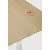 Featuring Bok White Us Oak Adjustable Desk by Ethnicraft at Amethyst Home. The Bok adjustable desk was designed with the importance of health and good posture in mind. The motorised system in its legs allows the tabletop to be elevated to the height of your liking. That way, you can easily switch between sitting and standing throughout the workday. Choose between white or black meta. Amethyst Home provides interior design, new construction, custom furniture, and area rugs in the Seattle metro area