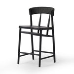 Featuring Buxton Black Rush Bar + Counter Stool by Four Hands at Amethyst Home. A solid oak counter stool defined by tapered legs and framing gives an updated look to the classic whistler chair. Finished with a paper rush wrapped detail on the back.BarOverall Dimensions: 19.25"w x 22.25"d x 42.75"hWeight: 23.70 lbsCounterOverall Dimensions: 19.50"w x 22.25"d x 38.75"hWeight: 21.6. Amethyst Home provides interior design, new construction, custom furniture, and area rugs in the Washington metro area