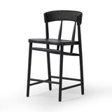 Featuring Buxton Black Rush Bar + Counter Stool by Four Hands at Amethyst Home. A solid oak counter stool defined by tapered legs and framing gives an updated look to the classic whistler chair. Finished with a paper rush wrapped detail on the back.BarOverall Dimensions: 19.25"w x 22.25"d x 42.75"hWeight: 23.70 lbsCounterOverall Dimensions: 19.50"w x 22.25"d x 38.75"hWeight: 21.6. Amethyst Home provides interior design, new construction, custom furniture, and area rugs in the Washington metro area