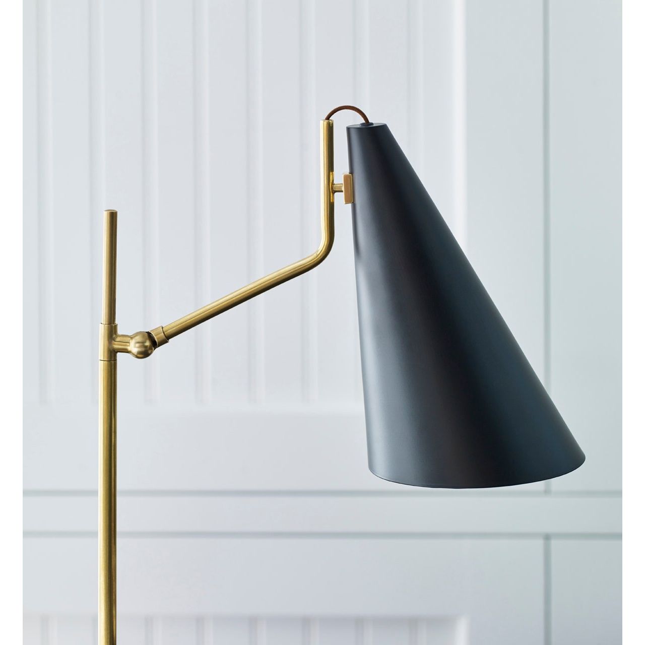 Featuring Clemente Table Lamp Brass with Black by Visual Comfort at Amethyst Home. The Clemente by AERIN offers refined angles and sleek detailing while lighting with elegant simplicity. Elongated conical shades provide a modern balance to a mid-century design with antique brass finishes. Any hallway or library will be enhanced with the Clemente, especially behind a favorite rea. Amethyst Home provides interior design, new construction, custom furniture, and area rugs in the Los Angeles metro area