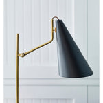 Featuring Clemente Table Lamp Brass with Black by Visual Comfort at Amethyst Home. The Clemente by AERIN offers refined angles and sleek detailing while lighting with elegant simplicity. Elongated conical shades provide a modern balance to a mid-century design with antique brass finishes. Any hallway or library will be enhanced with the Clemente, especially behind a favorite rea. Amethyst Home provides interior design, new construction, custom furniture, and area rugs in the Los Angeles metro area
