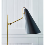 Featuring Clemente Table Lamp Brass with Black by Visual Comfort at Amethyst Home. The Clemente by AERIN offers refined angles and sleek detailing while lighting with elegant simplicity. Elongated conical shades provide a modern balance to a mid-century design with antique brass finishes. Any hallway or library will be enhanced with the Clemente, especially behind a favorite rea. Amethyst Home provides interior design, new construction, custom furniture, and area rugs in the Los Angeles metro area