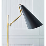 Featuring Clemente Table Lamp Brass with Black by Visual Comfort at Amethyst Home. The Clemente by AERIN offers refined angles and sleek detailing while lighting with elegant simplicity. Elongated conical shades provide a modern balance to a mid-century design with antique brass finishes. Any hallway or library will be enhanced with the Clemente, especially behind a favorite readi. Amethyst Home provides interior design, new construction, custom furniture, and area rugs in the Nashville metro area
