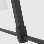 Featuring Danica Large Linear Chandelier Aged Iron by Visual Comfort at Amethyst Home. Elevate your space with the Danica Large Linear Chandelier in Aged Iron. This exquisite chandelier seamlessly combines form and function, with its elegant design and illuminating light. Perfect for creating a luxurious ambiance, this chandelier is the perfect addition to any sophisticated setti. Amethyst Home provides interior design, new construction, custom furniture, and area rugs in the Des Moines metro area