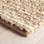 It doesn't get any easier than this all-natural jute stunner, with a unique hand-braided weave in a sun-bleached natural hue. Add the Annie Selke Dash & Albert Jute Bleached Oak handwoven rug to any space for a dose of organic chic. Amethyst Home provides interior design, new home construction design consulting, vintage area rugs, and lighting in the Des Moines metro area.