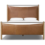 Slightly scooped top-grain leather tufting is bridged with metal bars in brushed brass for modern detailing. Aged smoked oak frames the three-paneled headboard and footboard wrapped in chestnut top-grain leather. Rounded legs soften the look Amethyst Home provides interior design, new home construction design consulting, vintage area rugs, and lighting in the Des Moines metro area.