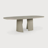 The Canyon masterfully captures the essence of fluid movement into a solid form. Mirroring the natural flow and balance of a canyon, this dining table features legs positioned to interact dynamically, creating a corresponding yet intriguing balance. Amethyst Home provides interior design, new home construction design consulting, vintage area rugs, and lighting in the Charlotte metro area.