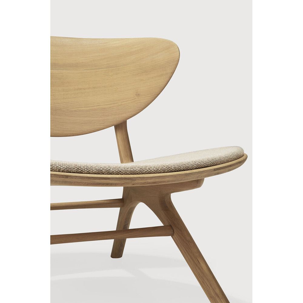 Featuring Eye Off White Oak Lounge Chair by Ethnicraft at Amethyst Home. Beauty is in the eye of the beholder. With sleek, angular, front legs and flowing smooth connections, the Eye lounge chair is a hallmark solid wooden seating design. The curved backrest, reminiscent of a winked eye, inspired the name of the chair. Think subtle elegance with a stylish edge.Weight : 51 lb Dimen. Amethyst Home provides interior design, new construction, custom furniture, and area rugs in the Nashville metro area