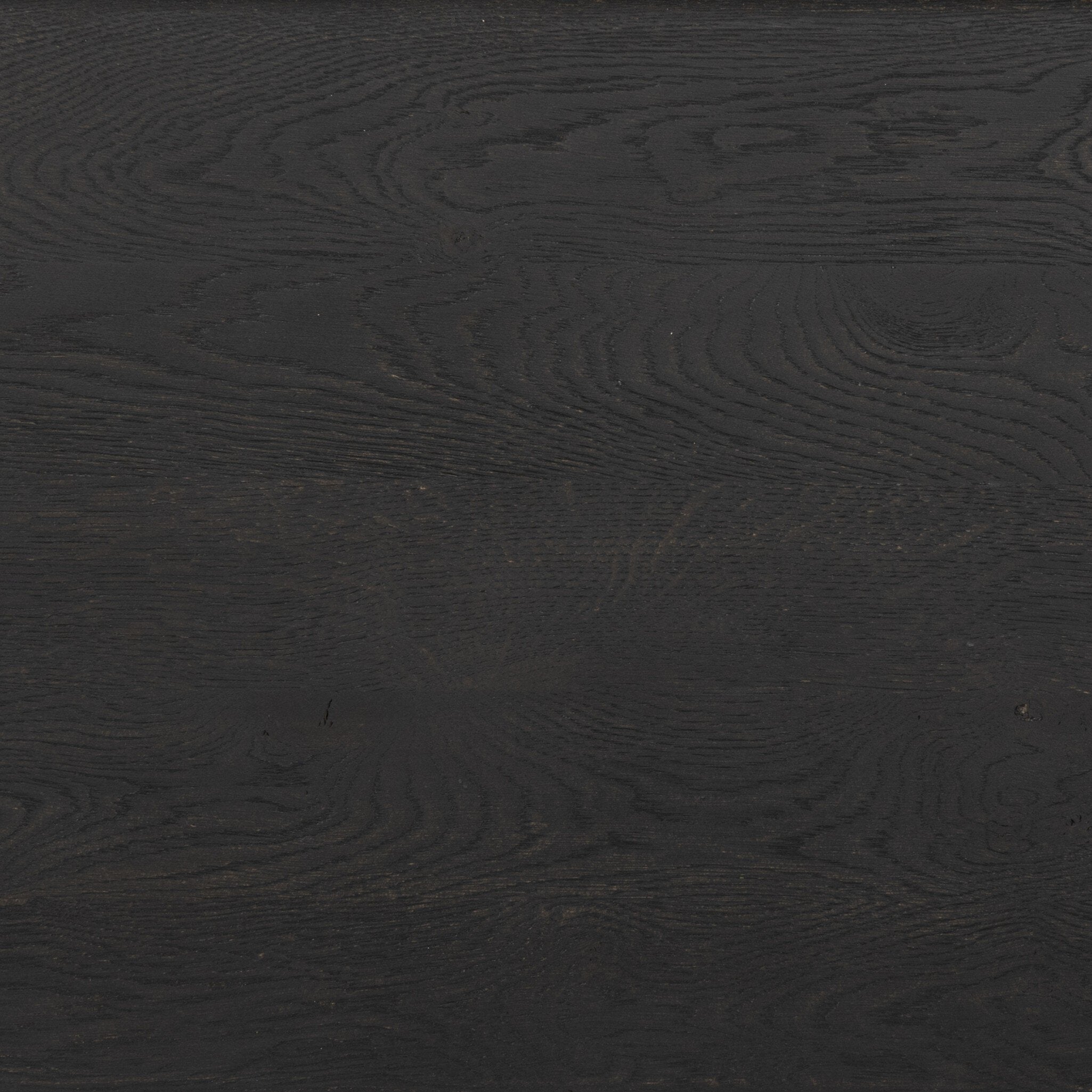 Featuring Ezri Black Oak Sideboard by Four Hands at Amethyst Home. Grain and character variation within a solid oak finish give this sideboard organic visual interest. The carved design and floor-to-top cylinder legs give a primitive look that balances the movement of the wood pattern.Overall Dimensions: 98.00"w x 18.00"d x 34.00"hWeight : 245.38 lbsMaterials : Solid Oak. Amethyst Home provides interior design, new construction, custom furniture, and area rugs in the Newport Beach metro area