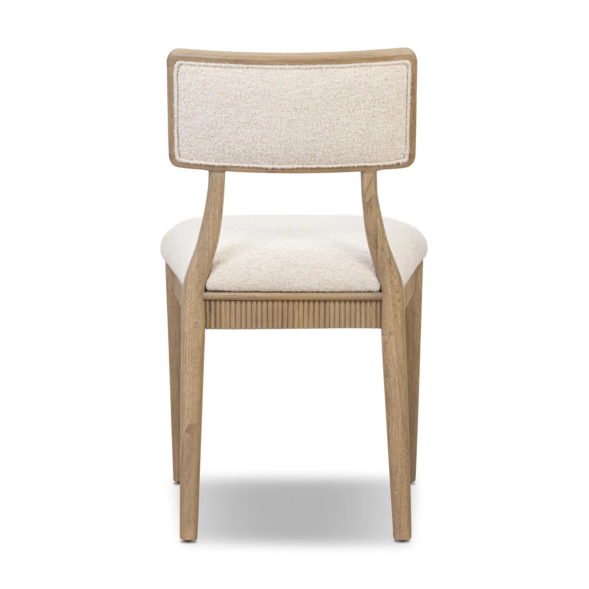 As fans of luxe style at Amethyst, we love the nature inspired Burkhart Dining Chair - Charter Oatmeal. This item pairs well with other brands such as Surya and is perfect for modern homes Amethyst Home provides interior design, new home construction design consulting, vintage area rugs, and lighting in the Austin metro area.
