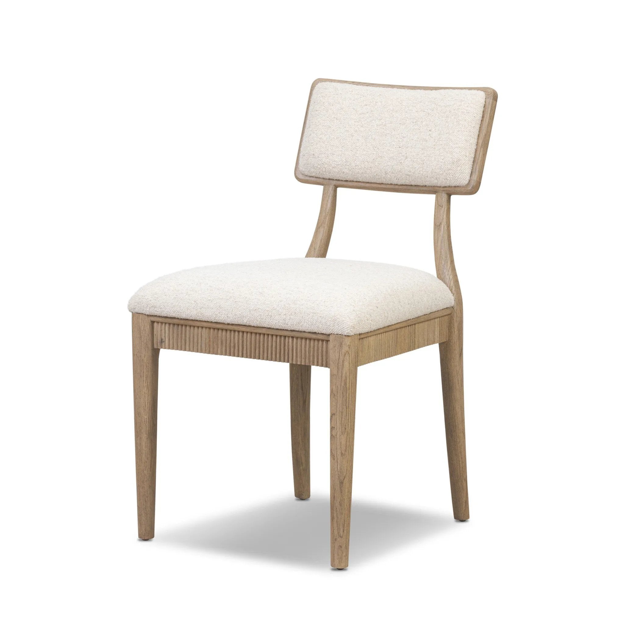 As fans of luxe style at Amethyst, we love the nature inspired Burkhart Dining Chair - Charter Oatmeal. This item pairs well with other brands such as Surya and is perfect for modern homes Amethyst Home provides interior design, new home construction design consulting, vintage area rugs, and lighting in the Boston metro area.