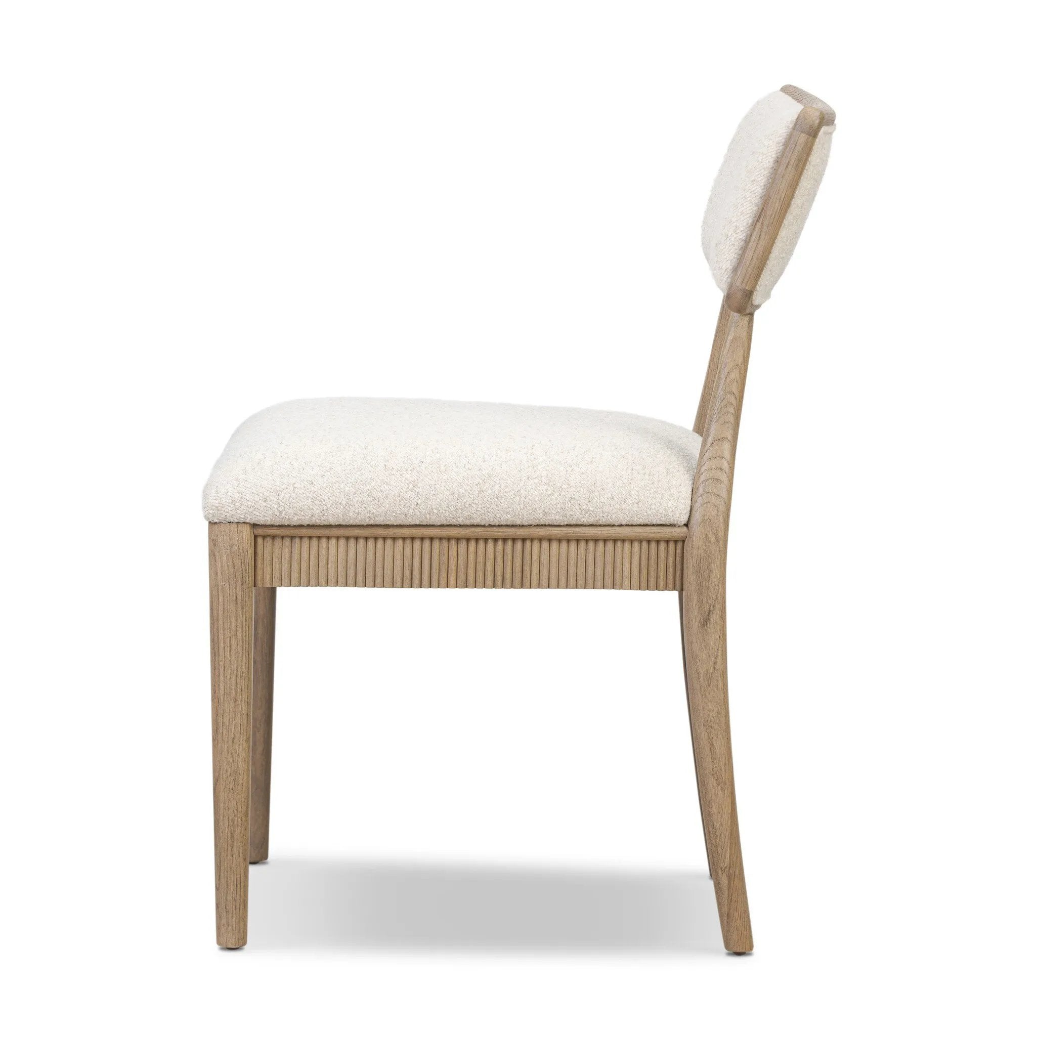 As fans of luxe style at Amethyst, we love the nature inspired Burkhart Dining Chair - Charter Oatmeal. This item pairs well with other brands such as Surya and is perfect for modern homes Amethyst Home provides interior design, new home construction design consulting, vintage area rugs, and lighting in the Los Angeles metro area.