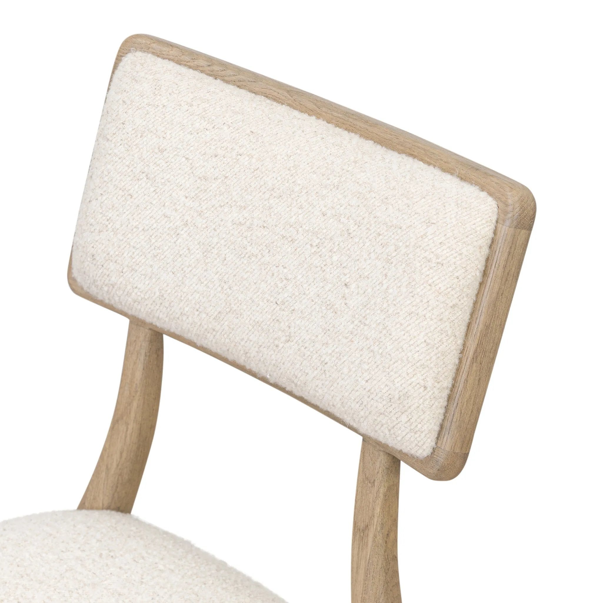 As fans of luxe style at Amethyst, we love the nature inspired Burkhart Dining Chair - Charter Oatmeal. This item pairs well with other brands such as Surya and is perfect for modern homes Amethyst Home provides interior design, new home construction design consulting, vintage area rugs, and lighting in the Washington metro area.