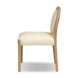 As lovers of natural design at Amethyst, we love the nature inspired Prentiss Dining Chair - Thames Cream. This item pairs well with other brands such as Visual Comfort and is perfect for eclectic homes Amethyst Home provides interior design, new home construction design consulting, vintage area rugs, and lighting in the Los Angeles metro area.